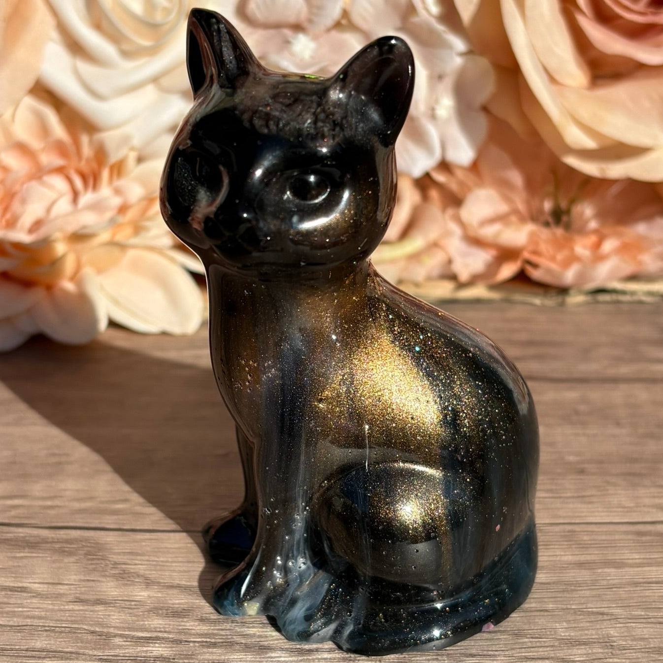 Katzenfiguren in verschiedenen Designs